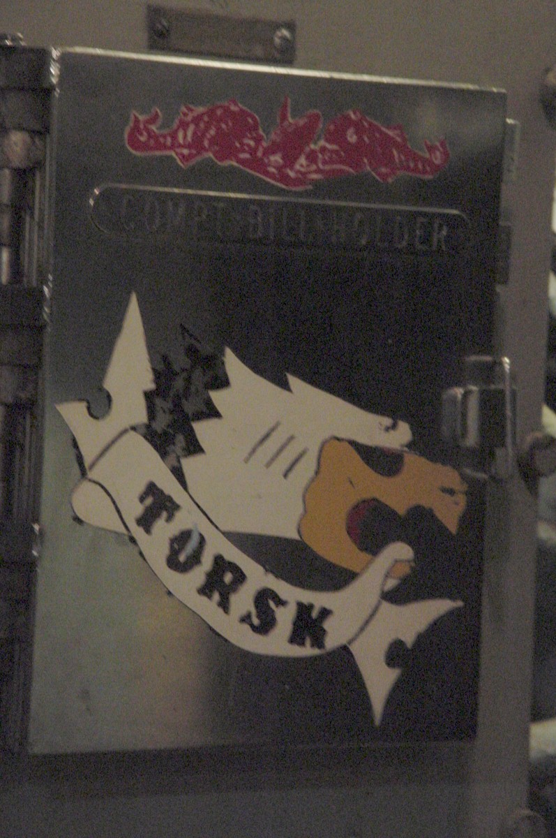 The boat's own insignia - a codfish in boxing gloves